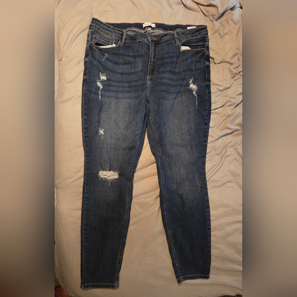 Distressed Blue Jeans